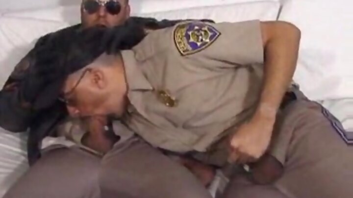 Police dudes suck on cock