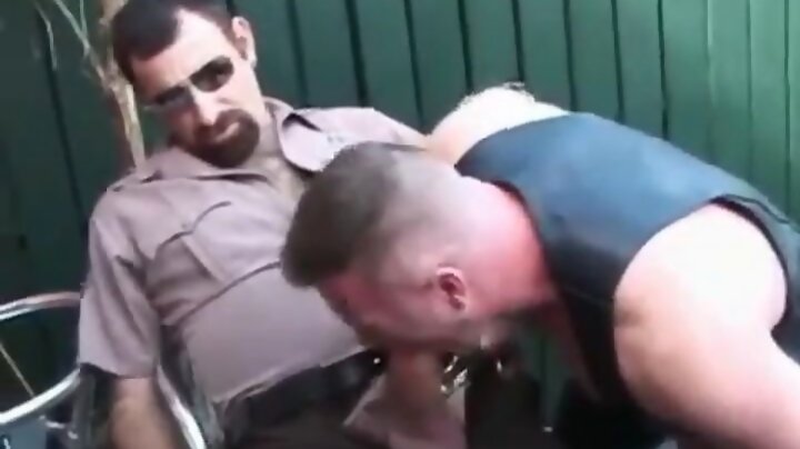 Cop fucks the leather bottom
