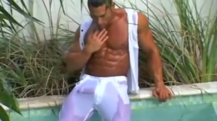 Bodybuilder in swimming pool