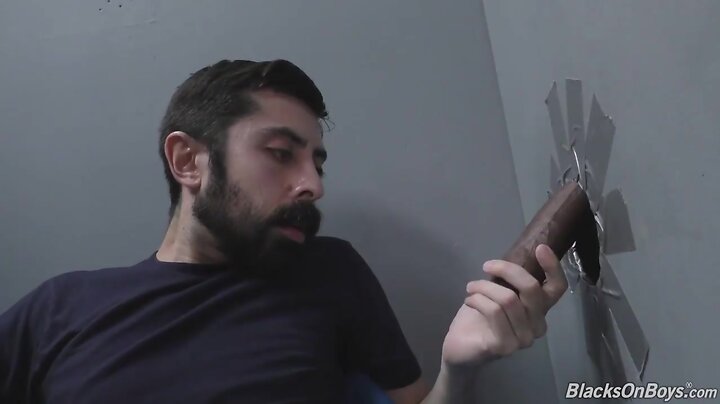 Bearded white man slurping and shagging a darky dick at a gloryhole