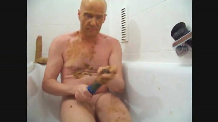 Solo scat toy sex in bathtub